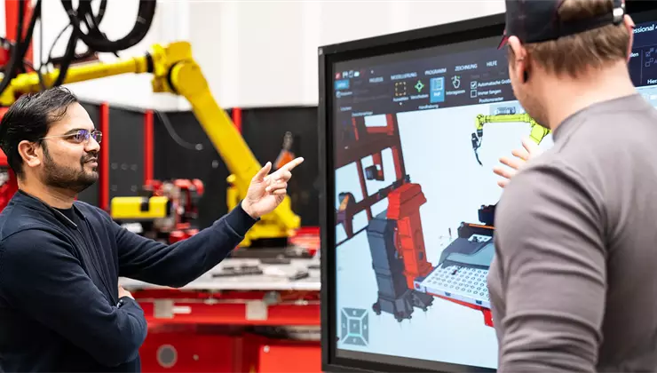 Two people work with Pathfinder